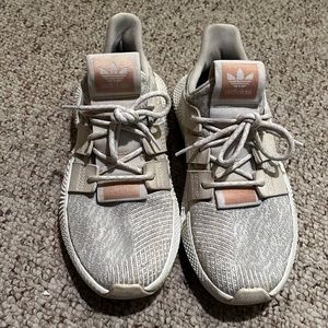 Adidas. Slight signs of wear but in good shape, great for lifting or fashion.